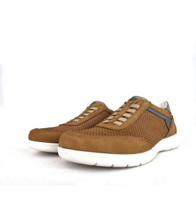 Foto de medio perfil: Zapato sin cordones con elásticos, diseño casual.