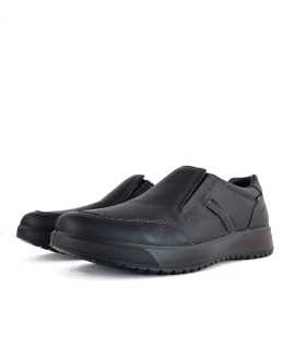 Foto de semiperfil de los zapatos impermeables de Grisport:
"Elásticos laterales para un ajuste práctico y cómodo."