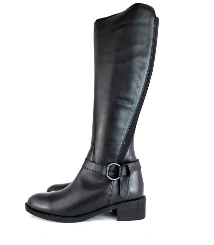 Vista de perfil de la botas caña alta plana en piel negra para mujer de Treintas