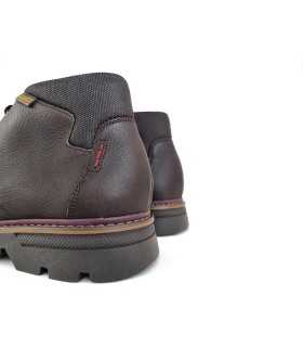 Foto del detalle del material:
Corte en piel marrón chocolate de bota Himalaya