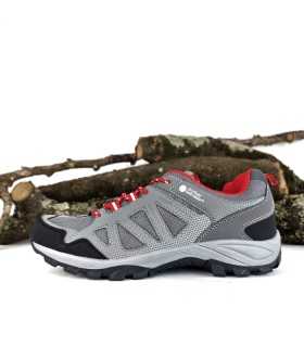 Vista de perfil de la zapatilla trekking Coachella hombre color gris