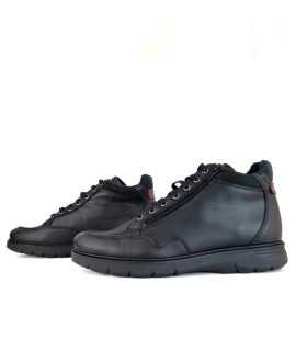 Botas piel negra impermeable hombre, vista del cierre de cramallera