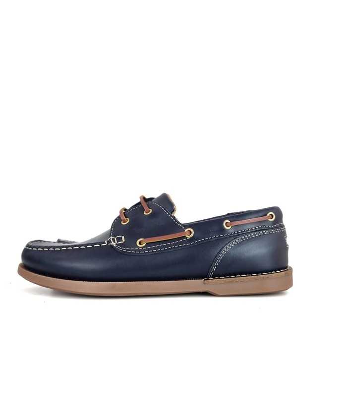 Vista de perfil: Estilo atemporal, con cordones y detalles en piel azul.