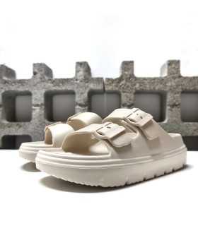Vista de perfil en color beige de chanclas Nicoboco