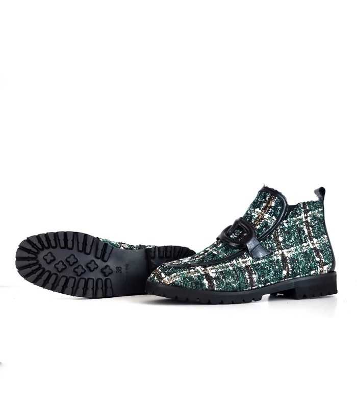 Suela del botón ABBA con tacón bajo negro de 3 cm.