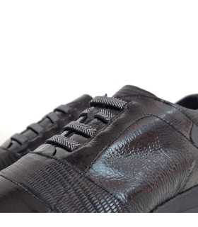 detalle del cierre con elásticos en ele empine de Zapatos piel negro mujer