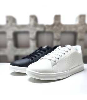 Vista de perfil de la zapatillas deportivas Hummel Court Trainers en color negro o blanca