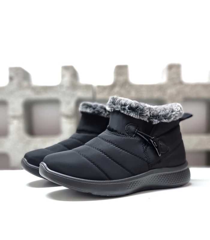 semi perfil de Botínes textil para mujer color negro