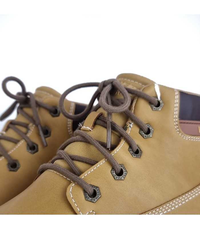 detalle cierre de cordones de Bota amarilla hombre Skechers
