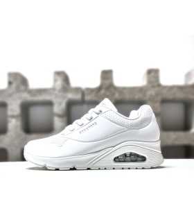 Deportivo blanco Uno Stand On Air de Skechers para mujer, vista de perfil