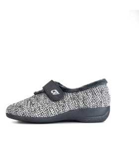Vista lateral de la zapatillas de casa para mujer, mostrando el tejido de espiga en gris y azul, con cierre de velcro color gris