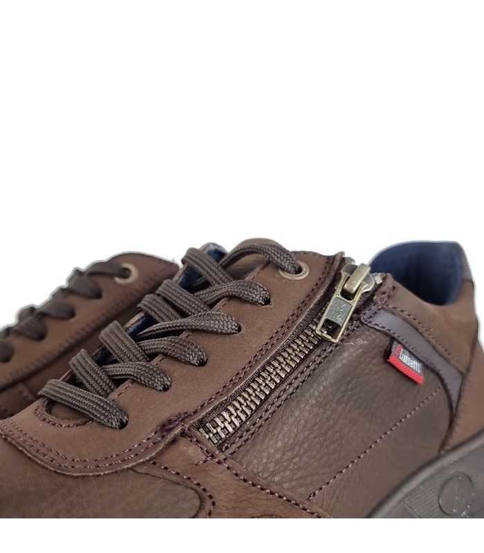 Detalle del cierre de cremallera de zapato marron de Luisetti