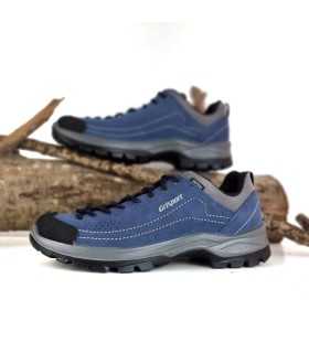 vista de los dos perfiles de Zapatilla trekking azul hombre impermeable