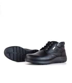 Vista del piso de poliuretano ligero y antideslizante del botón impermeable Luisetti de bota negra