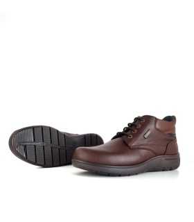 Vista del piso de poliuretano ligero y antideslizante del botón impermeable Luisetti de bota marron