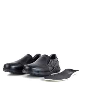 plantilla extraída junto a los zapatos negros impermeables de Zen