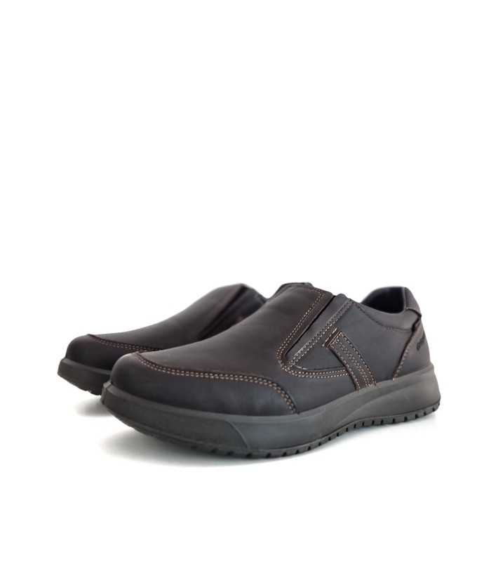 Vista de medio perfil mostrando el diseño impermeable y elásticos laterales del mocasín Grisport