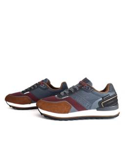 Zapatilla deportiva gris waterproof Coronel Tapioca en vista lateral.