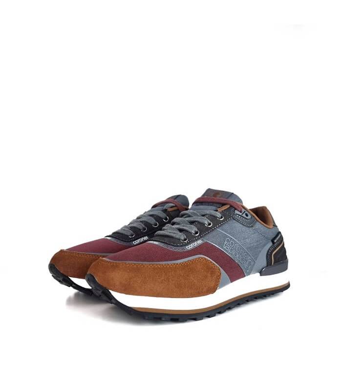 Zapatilla Coronel Tapioca casual gris con suela microporosa vista de medio perfil.