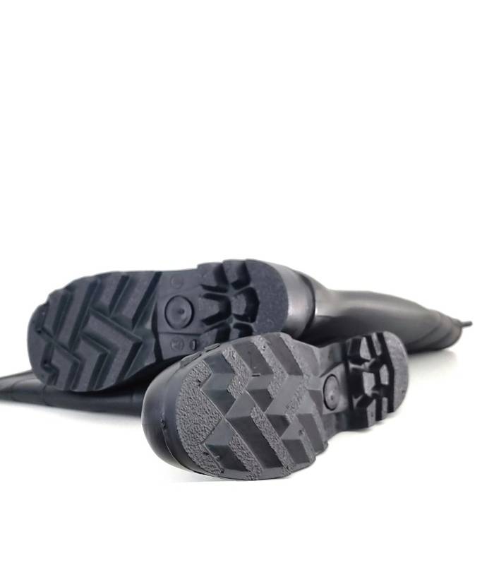 Vista de la suela de PVC de bota universal negra de Dunlop