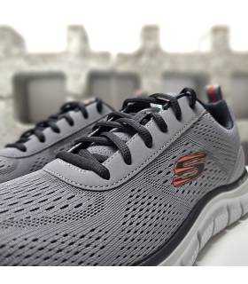 Detalle del tejido de malla de deportivo de Skechers color gris
