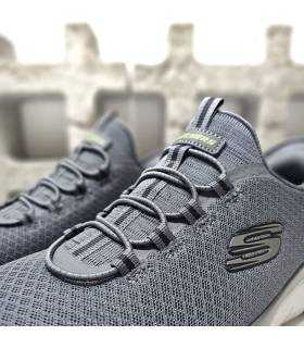 Detalle del tejido y cordones: Malla técnica transpirable en color gris marengo.