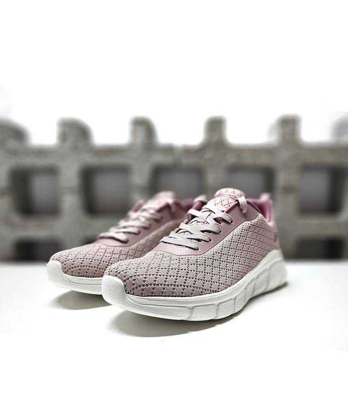 Vista de medio perfil: Deportivo rosa de Skechers en color gris con Memory Foam™.