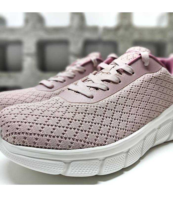 Detalle del tejido: Punto técnico transpirable con efecto acolchado de zapatilla deportiva rosa