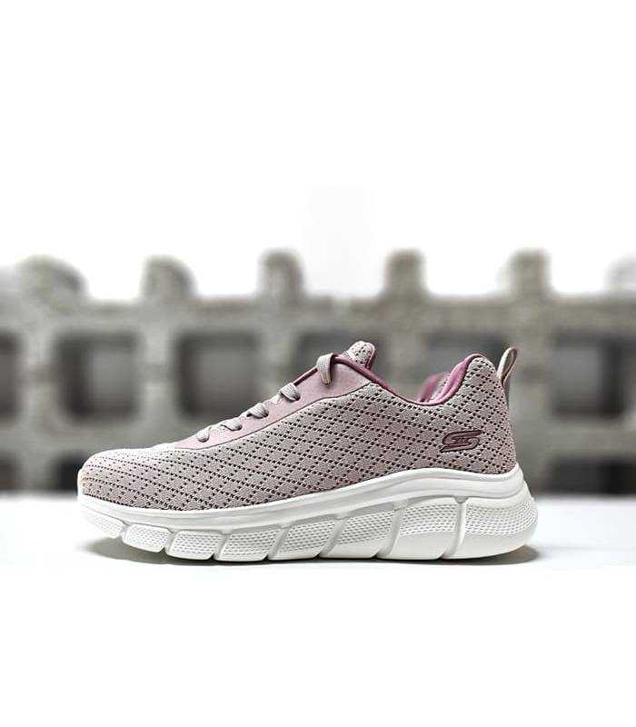 Foto lateral: Deportivo mujer Skechers B Flex Quick Pivot en color rosa.