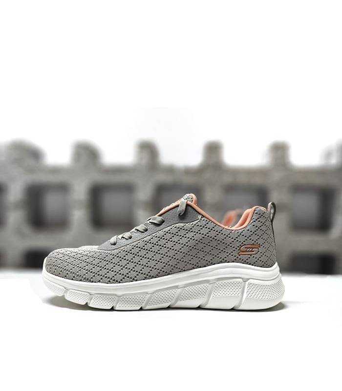 Foto lateral: Deportivo mujer Skechers B Flex Quick Pivot en color rosa.
