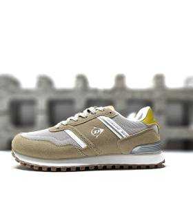Zapatillas deportivas de hombre Dunlop en color azul con cierre de cordones y diseño moderno, vista lateral