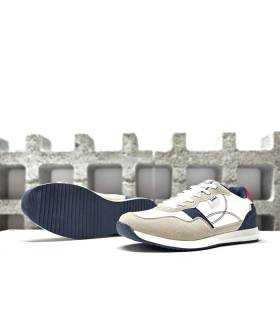 Detalle de la suela de goma termoplástica de las zapatillas deportivas blancas Lois para hombre.