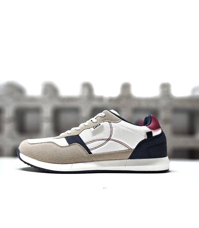 Vista lateral de las zapatillas Lois blnca para hombre con detalles en piel sintética.