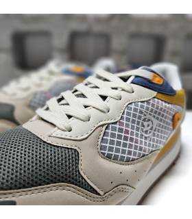 Detalle del corte de zapatilla verde de Dunlop