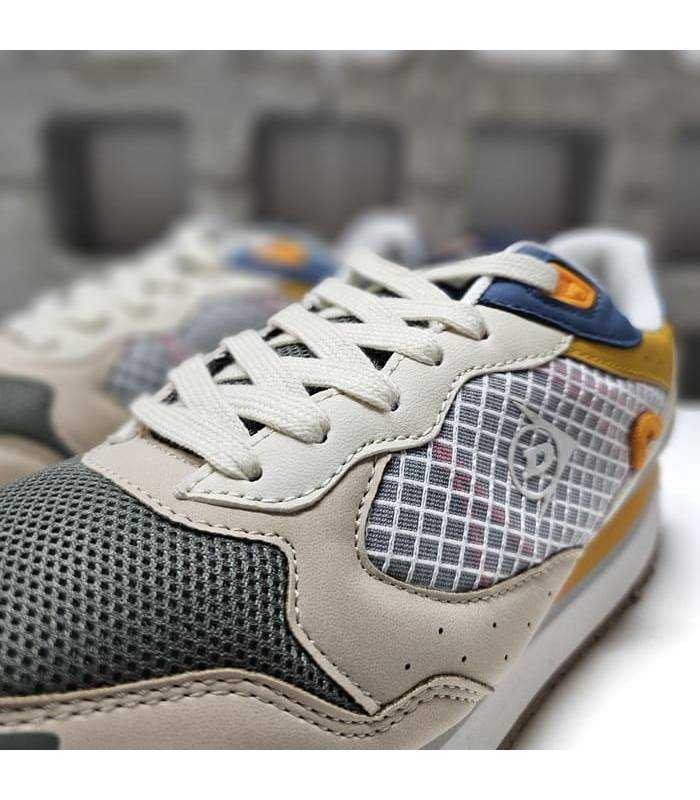 Detalle del corte de zapatilla verde de Dunlop