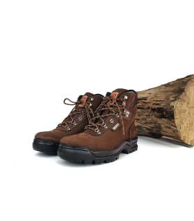 Medio perfil: Detalle lateral de la bota de trekking Notton-Tex marrón con membrana impermeable.