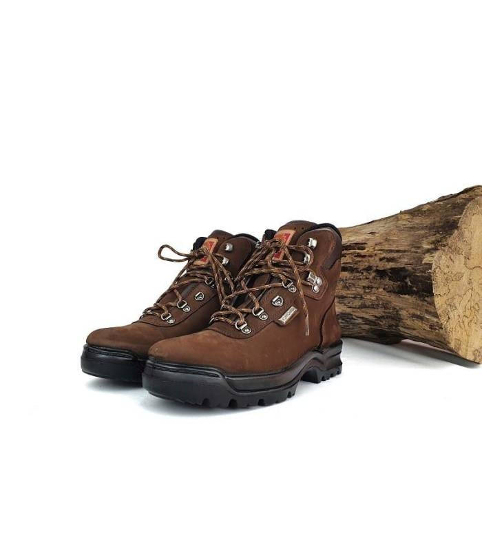 Medio perfil: Detalle lateral de la bota de trekking Notton-Tex marrón con membrana impermeable.