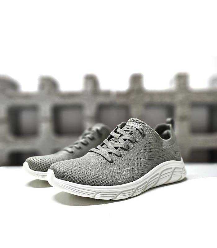 Vista de medio perfil: Zapatillas Skechers Graceful Stride en verde con estilo deportivo.