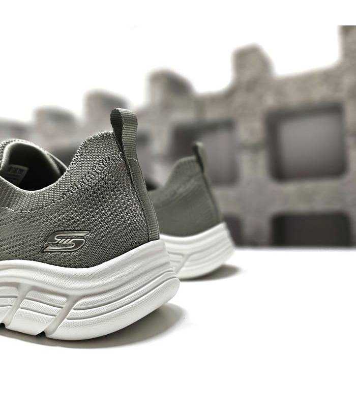 Vista trasera: Tacón de cuña discreto y talón reforzado de la zapatilla deportiva verde de Skechers