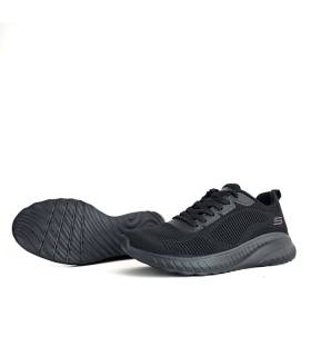 Suela Flexible: Goma antideslizante con diseño ergonómico para tracción óptima del deportivo negro de Skechers