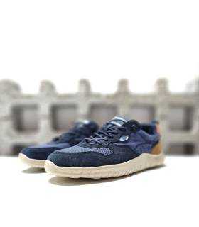 Zapatilla azul hombre juvenil con cordones, piel y textil combinado.