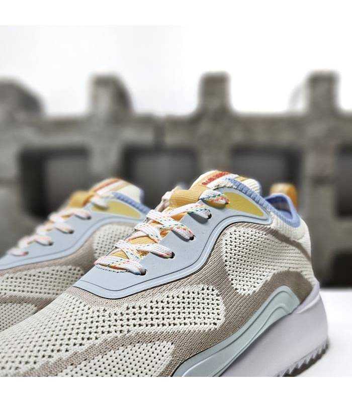 Detalle tejido textil transpirable deportivos mujer Kangaroos taupe.