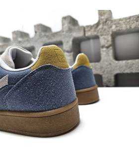 detalle amarillo talón zapatilla azul cielo mujer Paredes