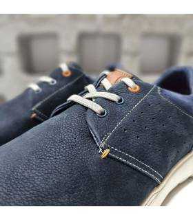 Zapatos Zen azul detalle cordones y perforado