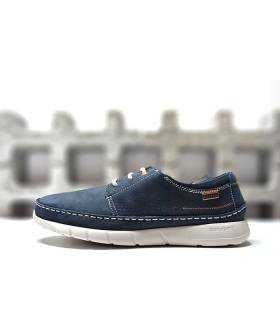 Vista lateral del zapatos SCORPIO3990 en piel azul para hombre, con piso blanco ultraligero y costuras a contraste.