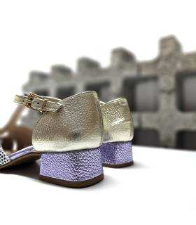 Vista trasera del zapato Nival Marin para mujer con talón dorado