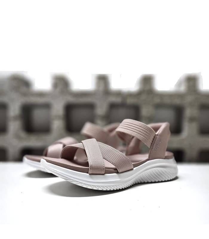 Vista de perfil sandalias rebajas Skechers rosa mujer con talón abierto.