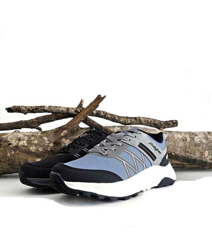 Zapatillas de senderismo para mujer modelo Restil de J’hayber, compartiva de los dos colores, azul y negro