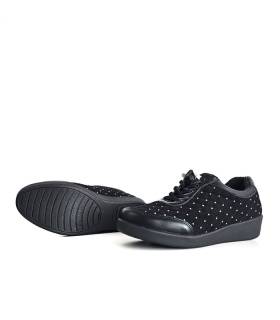 Zapatos deportivos mujer acolchados negros vista suela