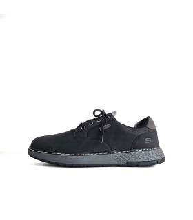 perfil lateral Skechers Garlan Pryor negros impermeables